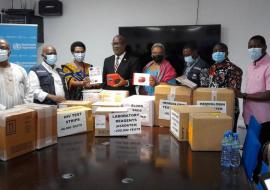 WHO and Ministry of Health officials with display of samples of the items being handed over