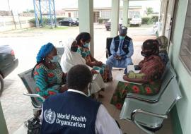 WHO supervisors interacting with some team members in Adamawa community