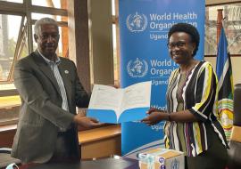 WHO Representative to Uganda, Dr Yonas Tegegn Woldemariam handing over 2400 mpox tests to the Minister of Health Hon Dr Jane Ruth Aceng Acero.