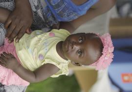 A child waiting to be vaccinated