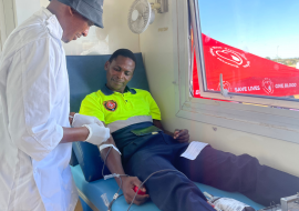 Blood donors donate blood at the World Blood Donor Day commemoration in Serowe