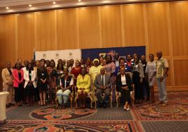 Mr Ben Nangombe, Executive Director of the Ministry of Health and Social Services with Dr Mary Brantuo, WHO Namibia OIC colleagues from AFRO,  Geneva and participants from 12 member states f