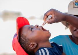 Child receiving polio vaccine