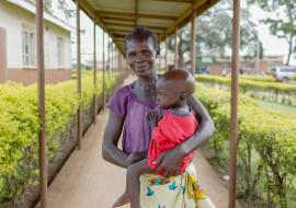 A mother with a child that is going through nutrition therapy in Koboko district 