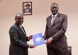 Dr Humphrey Karamagi, presents his letter of credentials to Honorable Ramadan Mohamed Abdallah Goc, Minister of Foreign Affairs and International Corporation, South Sudan