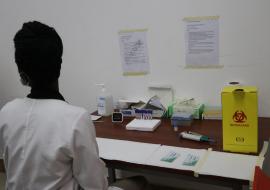 Healthcare worker screening a patient at Juba Teaching Hospital during the commemoration of the World Hepatitis Day in Juba