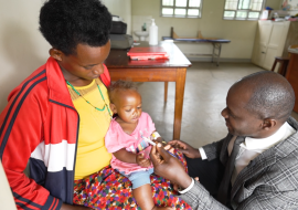 A mother interacts at the nutrition clinic