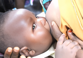 A mother breastfeeding her baby  