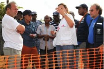 The delegation being briefed by MSF at the Ebola Treatment Site in Kailahun