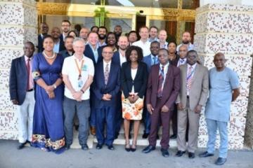 Group picture after the review in Abuja