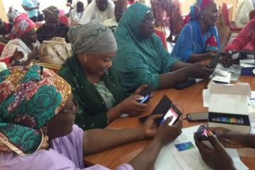 Health workers practicing real time reporting during EWARS in Borno