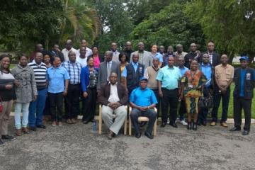 The participants from Ministry of Health, WHO Staff and the WHO Representative, Dr. Jacob Mufunda in the front row (right)