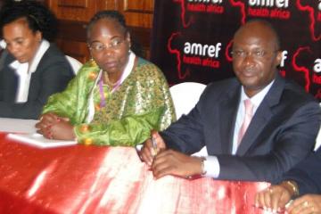 Kenya’s WHO country Representative Dr Custodia Mandlhate (in green) with Health Secretary Mr James Macharia at the 3-day Africa Health Conference which opened in Nairobi, November 24, 2014. The conference called for African-based solutions to health challenges.