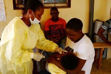 Child receiving measles vaccine