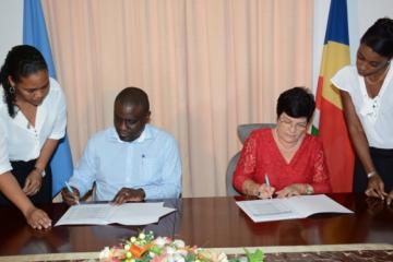 Dr. Karamagi (sitting in for the WHO Regional Director) and Minister Larue (MoH) during the ceremony Photo courtesy Seychelles Nation