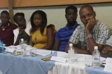 Participants listening to a demonstration of teaching methods