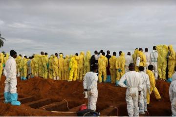 Volunteer burial teams have played a vital role in the disaster response