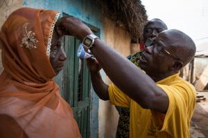 Fusi, an Opthalmic nurse screens communities in Yendi  Photo: Ruth McDowall/Sightsavers 2016