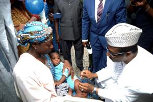 01 ED of NPHCDA administering vaccine to launch Meningitis A Conjugate Vaccine into Routine EPI Schedule.jpg