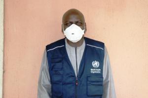 Dr Haruna Ismaila Adamu a WHO staff after exiting isolation following recovery from COVID-19.jpg (