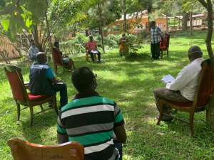 WHO official conducts community engagement in one of the communities in Masaka district