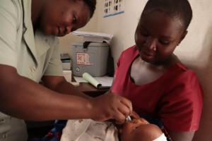 A child receiving vaccine during the commemorations