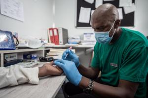 Africa cuts HIV infections, deaths but key targets still elusive