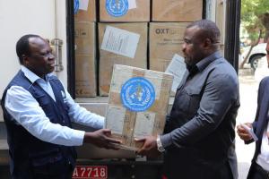 Acting WHO Country Representative, Dr. Zabulon Yoti handing over the oxygen concentrators to the Deputy Minister of Health, Community Development, Gender and Children of Zanzibar