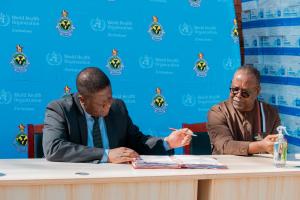 MoHCC Permanent Secretary Dr Jasper Chimedza and The WHO Country Representative for Zimbabwe Professor Jean-Marie Dangou during the handover ceremony