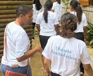 Two participants in the Stakeholders' Roundtable walking the talk. 