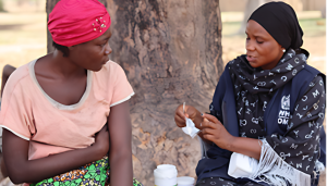 Ladi and a health worker in fufore, LGA during couselling session