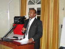 . Dr Ian Njeru, head of  Disease Surveillance and Response Unit (MOH), speaks to stakeholders during the cholera meeting.