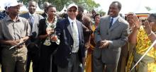 02 Dr Alemu applauded by the DG of Health Services Dr J. R. Aceng, Minister Dr E. Tumwesigye after signing a plaque symbolising the launch of the Partnership for HIV free Survival Initiative on behalf of the donor