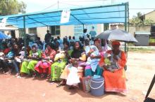 Mothers with their children ready to be vaccinated