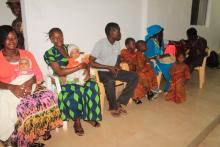  Members of the congregation waiting in turns to check their blood pressure