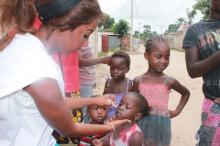 Vaccinator administering the polio vaccine