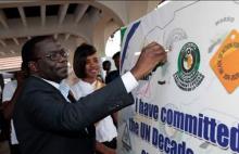 Country Director African Dev Bank signing road safety commitment