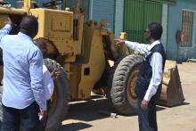 Dr Sagoe-Moses and Mr Shapumba at the site where the maternity waiting home will be constructed