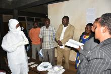  WHO Team member demonstrating the proper use of the PPE to medical staff of Kapchorwa hospital, near Kween district where a Marburg outbreak has been confirmed.