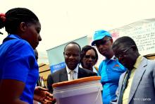 Delegates visit one of the stalls put up by an implementing partner 