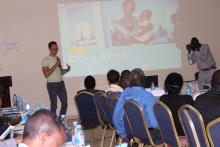 A consultant making a presentation on what the end of polio funding could mean for South Sudan’s immunization systems and the way forward