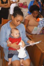 The highlight of the launch at the English River Health Facility in Victoria, baby Lucas becomes the first baby to receive the Pneumococcal Conjugate Vaccine (PCV), whilst other children await their turn to receive the life-saving injection.