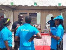 UN staff visit the WHO & UNAIDS stall