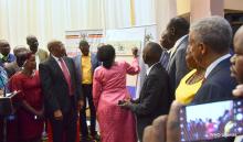  Minister of Health Dr Jane Ruth Aceng signs on a copy of the HSIRRP to launch the plan as government officials and partners look on 