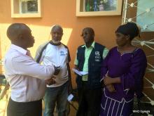 Left to right: Isma Muhindo, Abdulkarim Twaha, Benjamin Sensasi and Mimi Ngamitha engage in a discussion during a break at the meeting with the urban-based Congolese refugees.