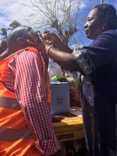 Dr Alcinda de Abreu, the Governor's wife, performed the first vaccinations. Here the first is a health worker with the Ministry of Health