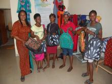 L-R Mrs Lucia Enyia poses with beneficiaries Ada, Patience, Ene and Nnbua of SOWCHAN