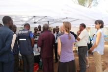 The vaccination team walking the guests on the procedures