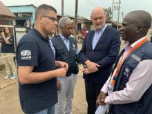 1.	Hon Alok Shama, Dr Yonas Tegegn Woldermariam, HE Peter West and Mr Innocent Komakech in a discussion at Mponder border crossing. 