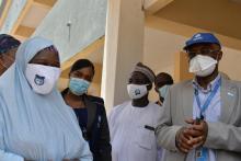 Dr Walter interacting with the college provost Hajiya Rukkaiya in Maiduguri after inspecting facilities at the College.jpg